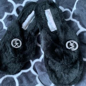 Michael Kors Jet Set thong faux fur sandals.